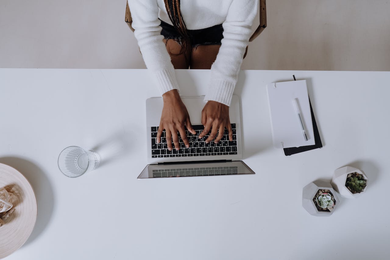 Woman using laptop.